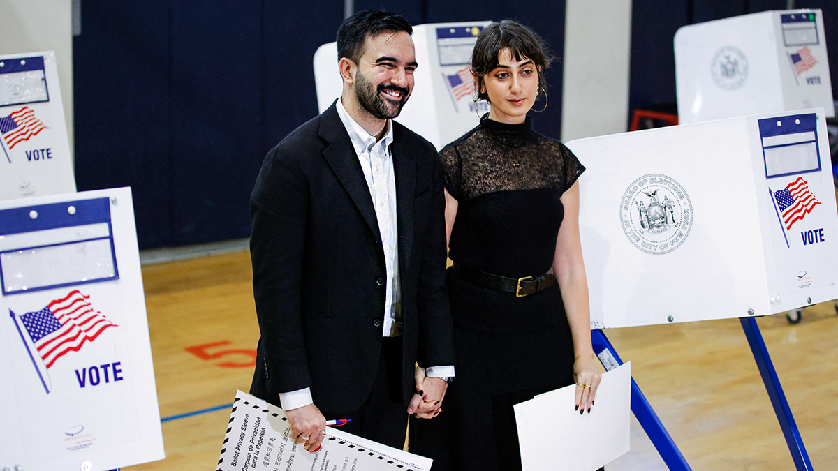 Zohran Mamdani voting with is wife.