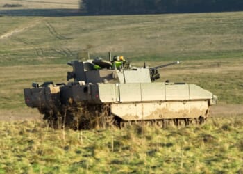 British army General Dynamics Ajax tank; (turreted, reconnaissance and strike) digitised, tracked, armoured fighting vehicle (AFV) in action.