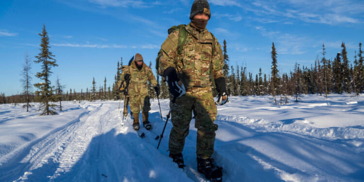 U.S. East Coast-based Naval Special Warfare, U.S. Army, Canadian, U.K., and interagency Special Operations Forces (SOF) traverse deep snow during medical training at Fort Wainwright, Alaska, Feb. 16, 2025.