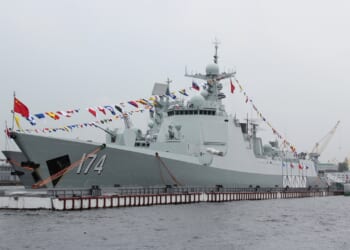 A Chinese warship at a dock.