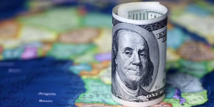 US dollars on the Africa map background. American investment and trading, African economy