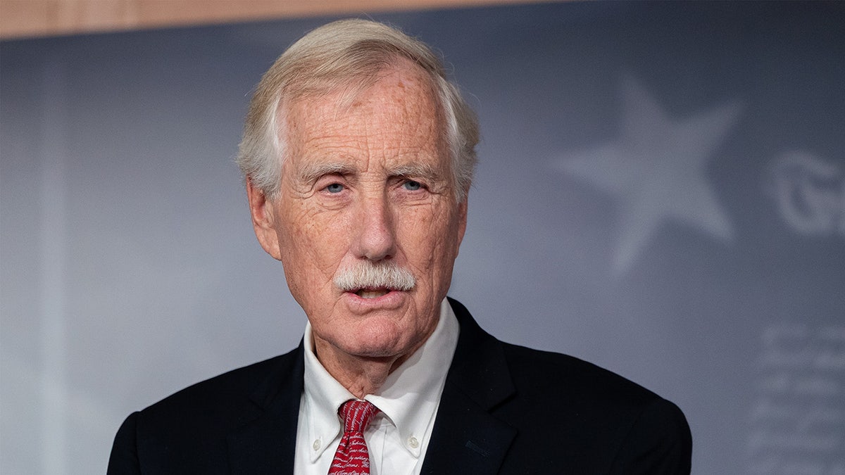 Angus King speaks at a press conference