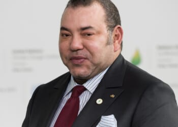 King Mohammed VI of Morocco appears at Paris COP21 conference.