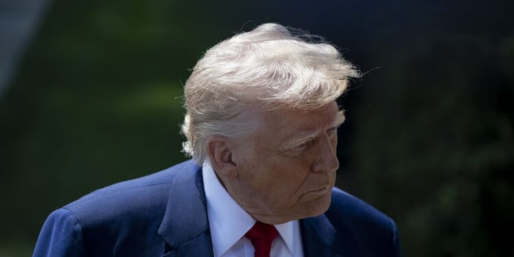 President Donald Trump departs from the White House.