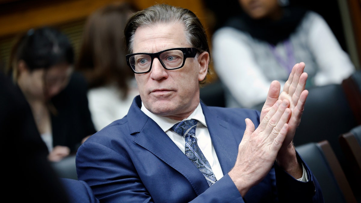 David Richardson clapping.