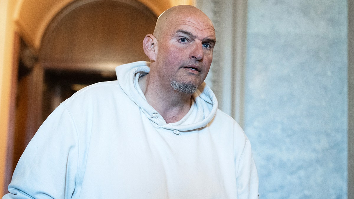 Sen. John Fetterman speaks to reporters