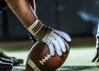 High School Coach Shoves Opposing QB, Sparks Sideline Brawl