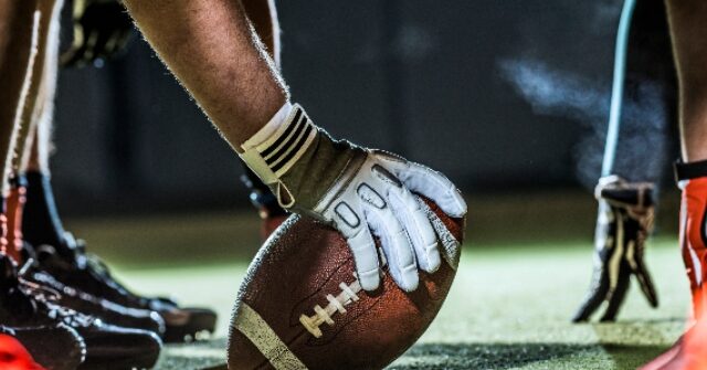 High School Coach Shoves Opposing QB, Sparks Sideline Brawl