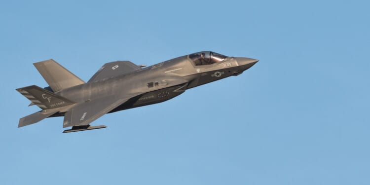 An F-35 Lightning II fighter jet in flight.