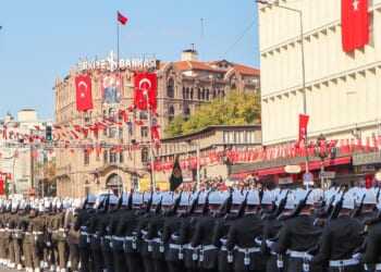 Turkish troops marching in a parade.