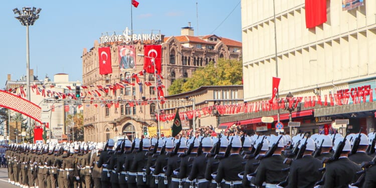 Turkish troops marching in a parade.