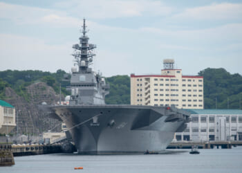 The Japan Maritime Self-Defense Force JS Kaga (DDH-184), an Izumo-class helicopter destroyer, sits at dock.