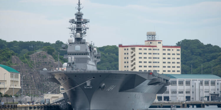 The Japan Maritime Self-Defense Force JS Kaga (DDH-184), an Izumo-class helicopter destroyer, sits at dock.