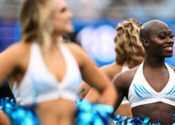 NFL's First Transgender Cheerleader Says Panthers Fired Him Because He Is Trans
