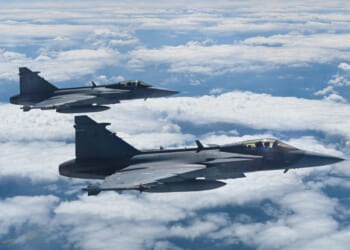 Two Saab JAS-39C Gripens, from the Czech Republic, fly alongside a B-52H Stratofortress, assigned to the 2nd Bomb Wing, Barksdale Air Force Base, Louisiana, in support of Bomber Task Force Europe 21-3, May 31, 2021.
