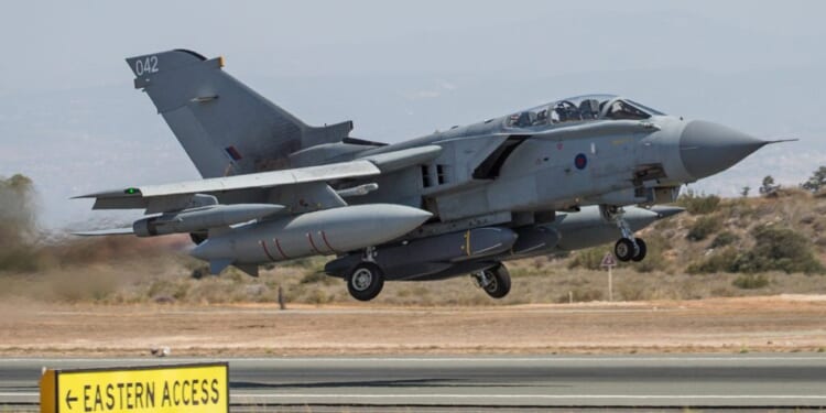 A RAF Tornado GR4 carrying two Storm Shadow missiles under its fuselage takes off at RAF Akrotiri in Cyprus on an Operation Shader mission, January 2019.