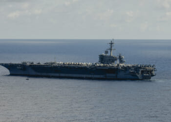 Nimitz-class aircraft carrier USS George Washington (CVN 73) steams during a search and rescue exercise while underway in the Philippine Sea, Aug. 9, 2025.
