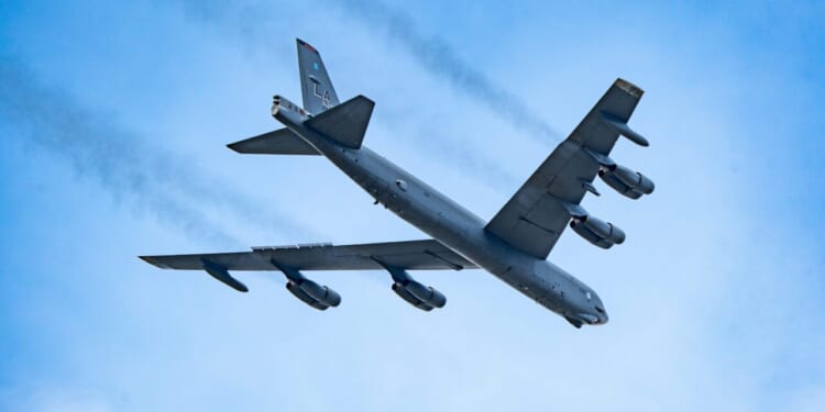 A B-52 flies by during an air show.