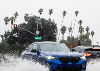 Residents Paddle Kayaks Through Southern California Streets