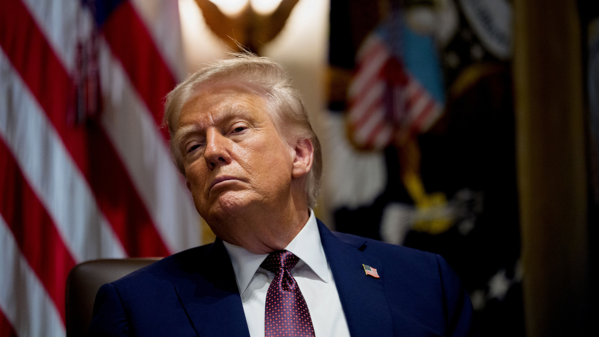 US President Donald Trump listens during a Cabinet meeting