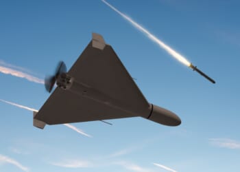 A drone flies in concert with a missile attack.