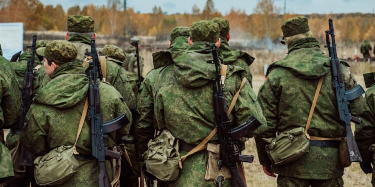 Mobilized Russian soldiers undergo combat training at the training ground.
