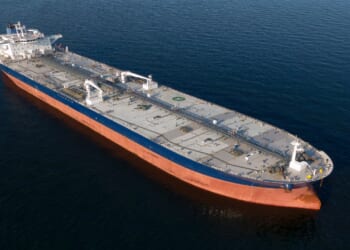 Oil Tanker in the Baltic Sea off at anchor, calm weather, drone shot. Russia energy warfare