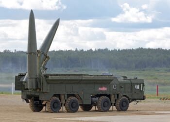 A pair of Russian Iskander missiles on the back of a launch vehicle.