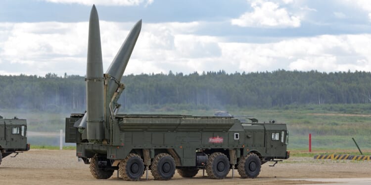 A pair of Russian Iskander missiles on the back of a launch vehicle.