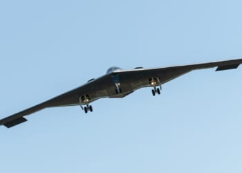 A B-2 Spirit with landing gear extended.