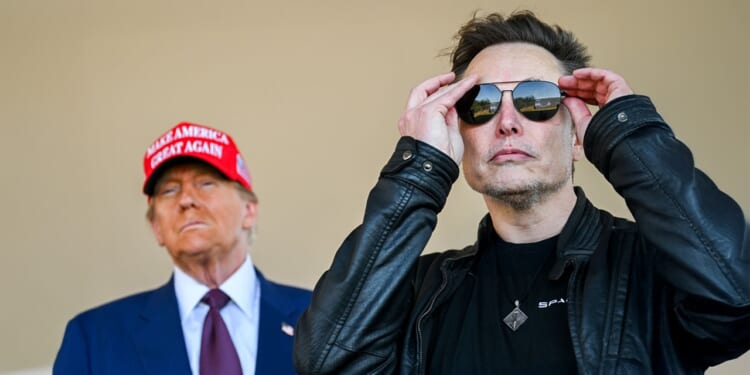 Donald Trump and Elon Musk watching a rocket launch.