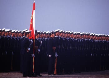 A group of Chinese sailors standing at attention.
