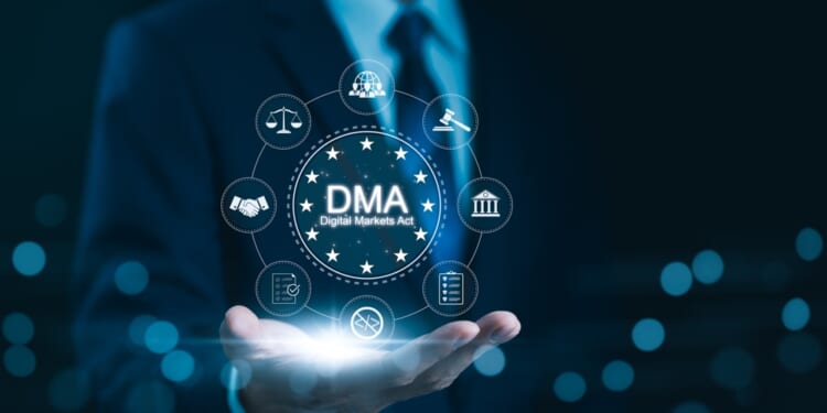 DMA, Digital Markets Act Concept. Businessman presents virtual "Digital Markets Act" with regulations icons, governance, and digital compliance. importance of legal frameworks in digital market. EU,
