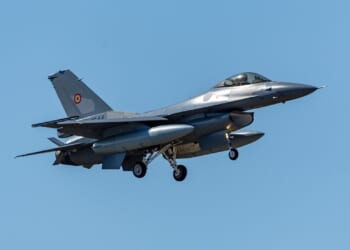 A Romanian F-16 fighter jet in flight.