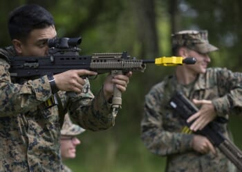 US and UK soldiers using an SA-80 bullpup rifle.