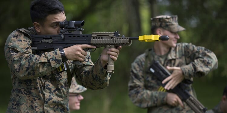 US and UK soldiers using an SA-80 bullpup rifle.