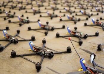 An array of drones on the ground.