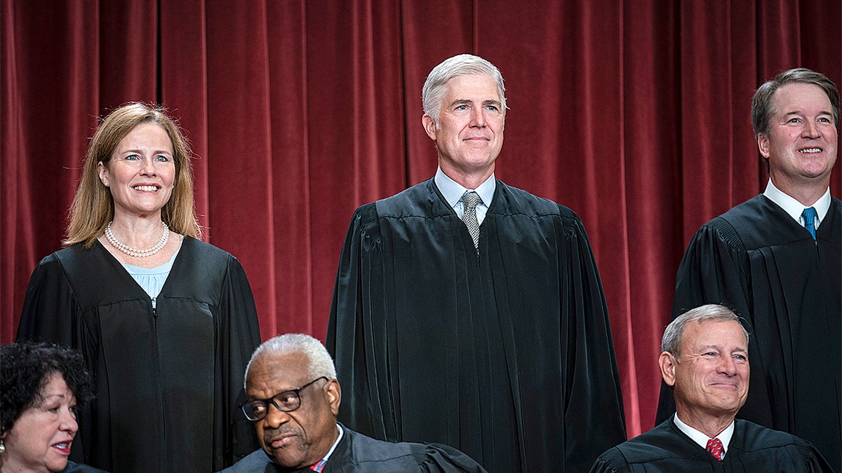 Supreme Court Associate Justices Amy Coney Barrett, Neil Gorsuch and Brett Kavanaugh