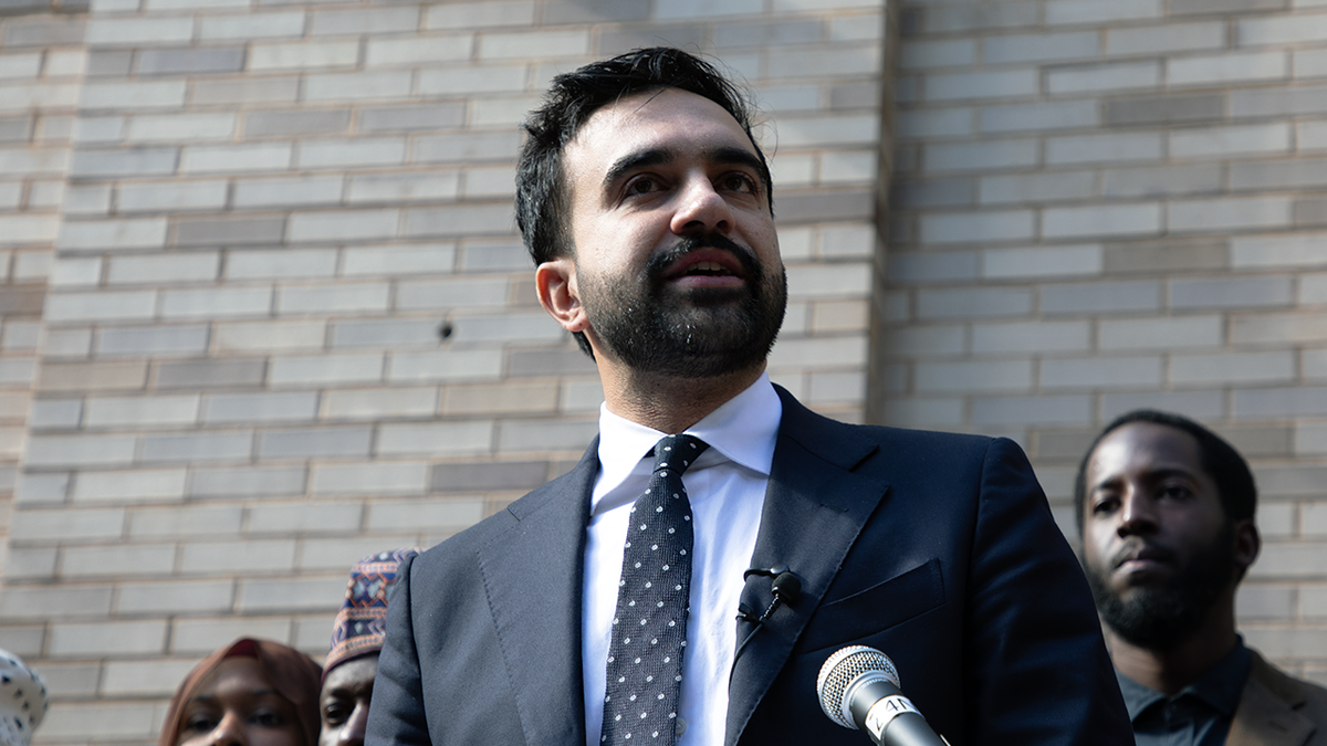 Zohran Mamdani speaking at an event.