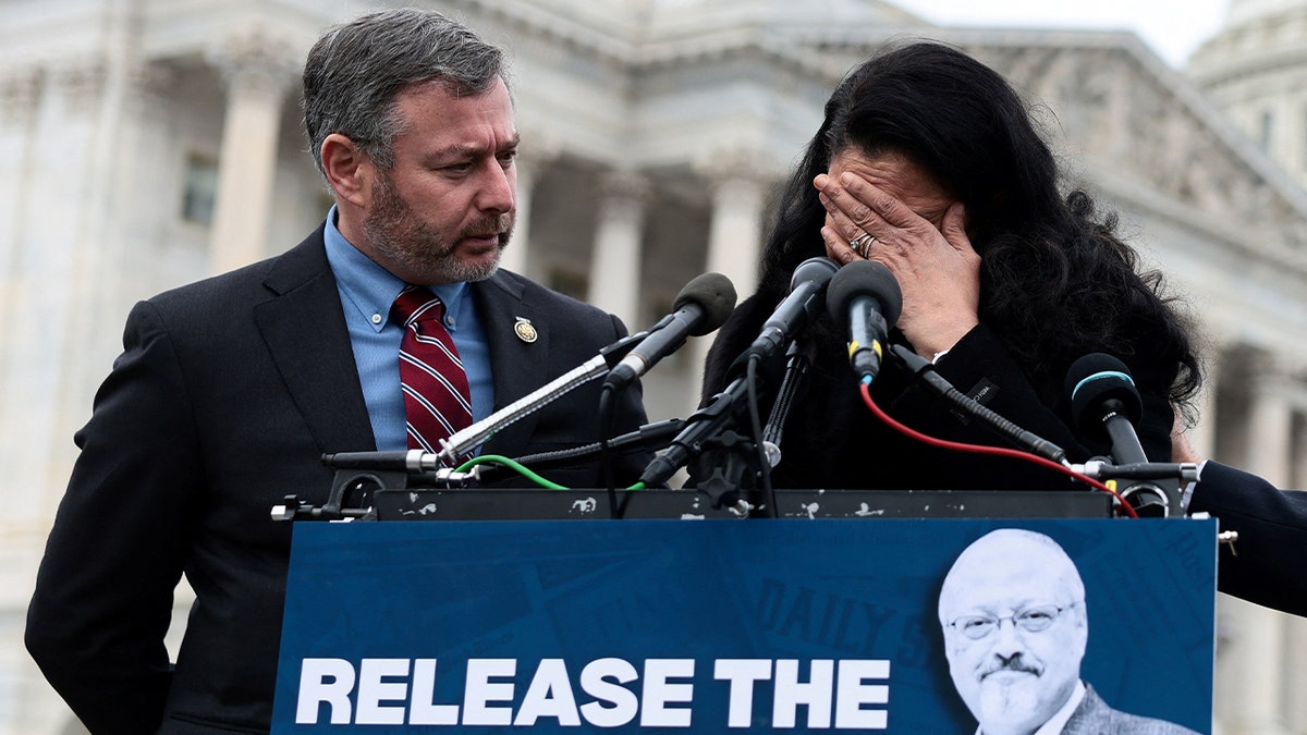 U.S. Rep Eugene Vindman (D-VA) and Hanan Elatr Khashoggi, the wife of murdered journalist Jamal Khashoggi urge U.S. President Donald Trump to release the transcript of his call with Saudi Crown Prince Mohammed bin Salman following Khashoggi’s 2018 killing, at a press conference outside the U.S. Capitol in Washington, D.C., U.S., November 21, 2025