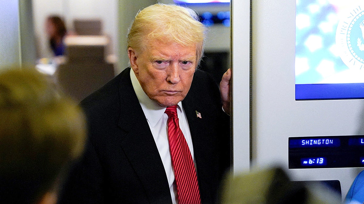 President Trump answers questions on Air Force One