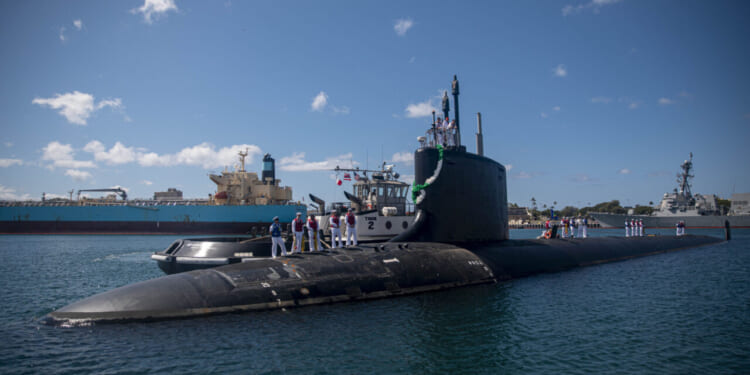 The Virginia-class fast-attack submarine USS Vermont (SSN 792) arrives at its new homeport of Joint Base Pearl Harbor-Hickam, July 27, 2023.