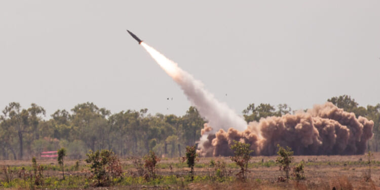 U.S. Soldiers from 1st Battalion, 3rd Field Artillery Regiment, 17th Field Artillery Brigade launch the Army Tactical Missile System (ATACMS) from the M142 High Mobility Artillery Rocket System (HIMARS) in Delamere, Northern Territory, Australia in support of Talisman Sabre 2023 on July 27, 2023.