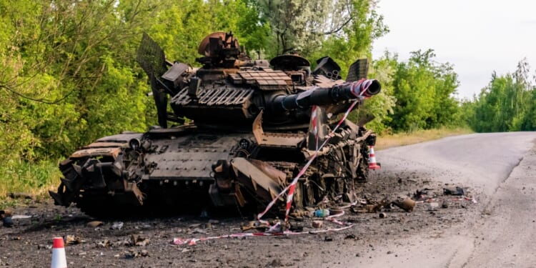 A destroyed tank near the front lines in Ukraine.