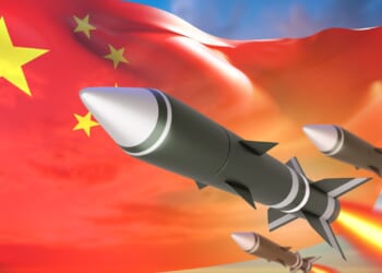 Missiles against a Chinese flag backdrop.