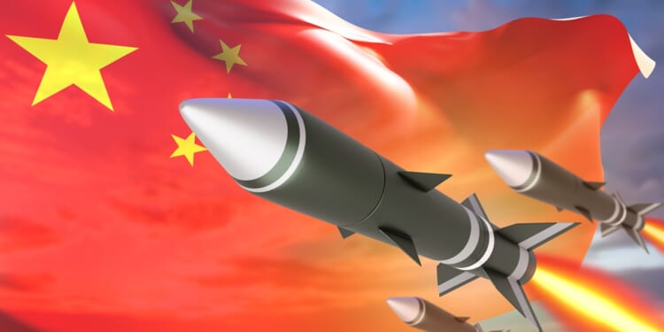 Missiles against a Chinese flag backdrop.