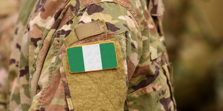A soldier with a Nigerian flag patch.