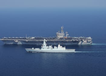 The HMS Diamond alongside the USS Eisenhower.