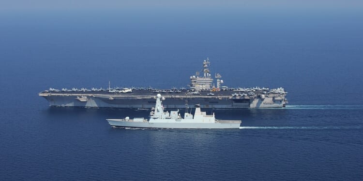 The HMS Diamond alongside the USS Eisenhower.