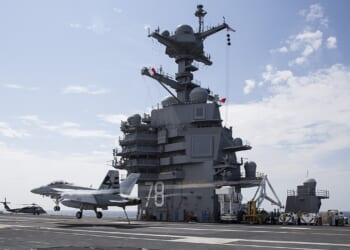 A fighter jet landing on the USS Gerald R. Ford.